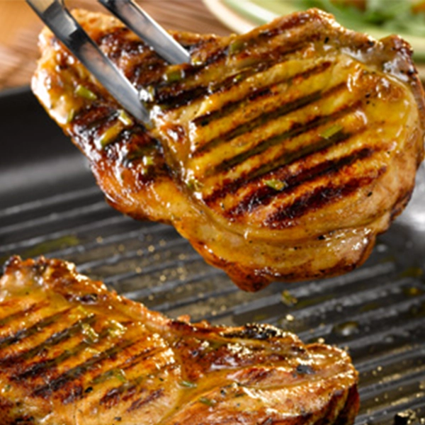 Pan-fried Pork Chops with orange and rosemary